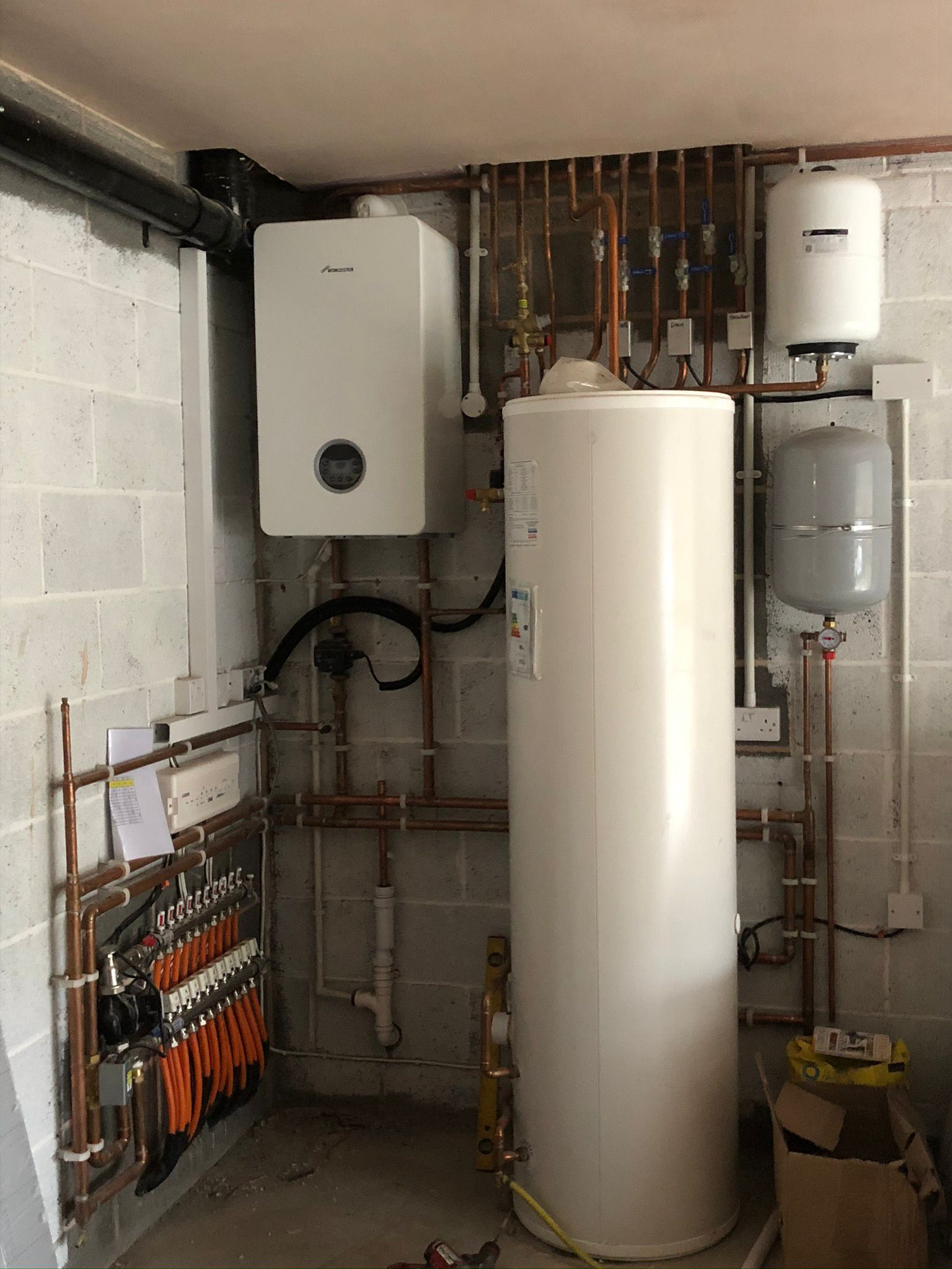 Wall-mounted boiler installation with smart controls