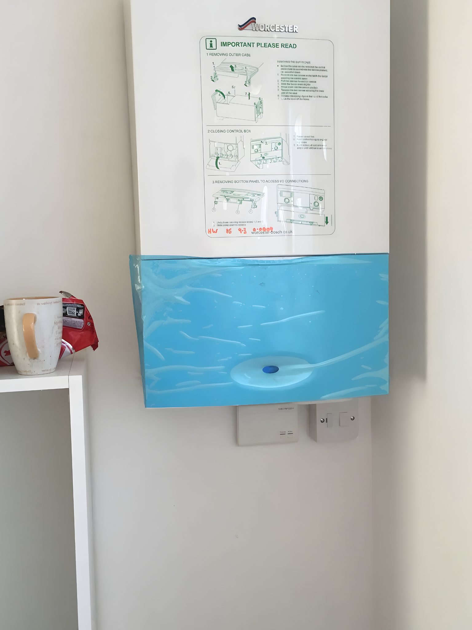 Boiler installation with lagged pipework and filter